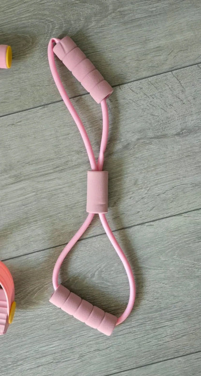 Roze weerstandsband met handvatten – figuur-8 design voor arm- en schouderoefeningen